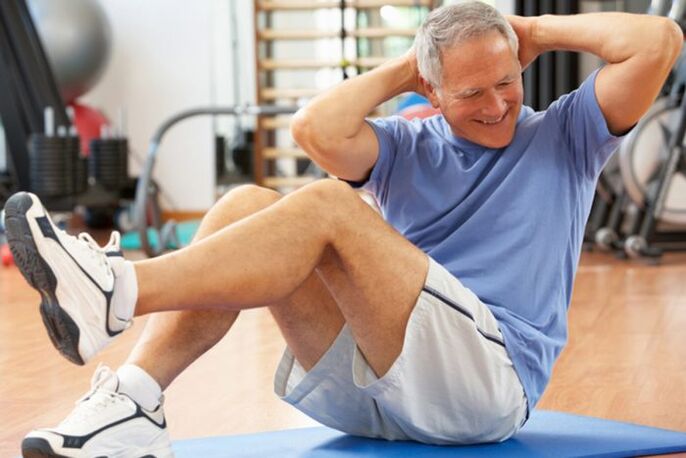 Man doing physical exercise to treat prostatitis. 
