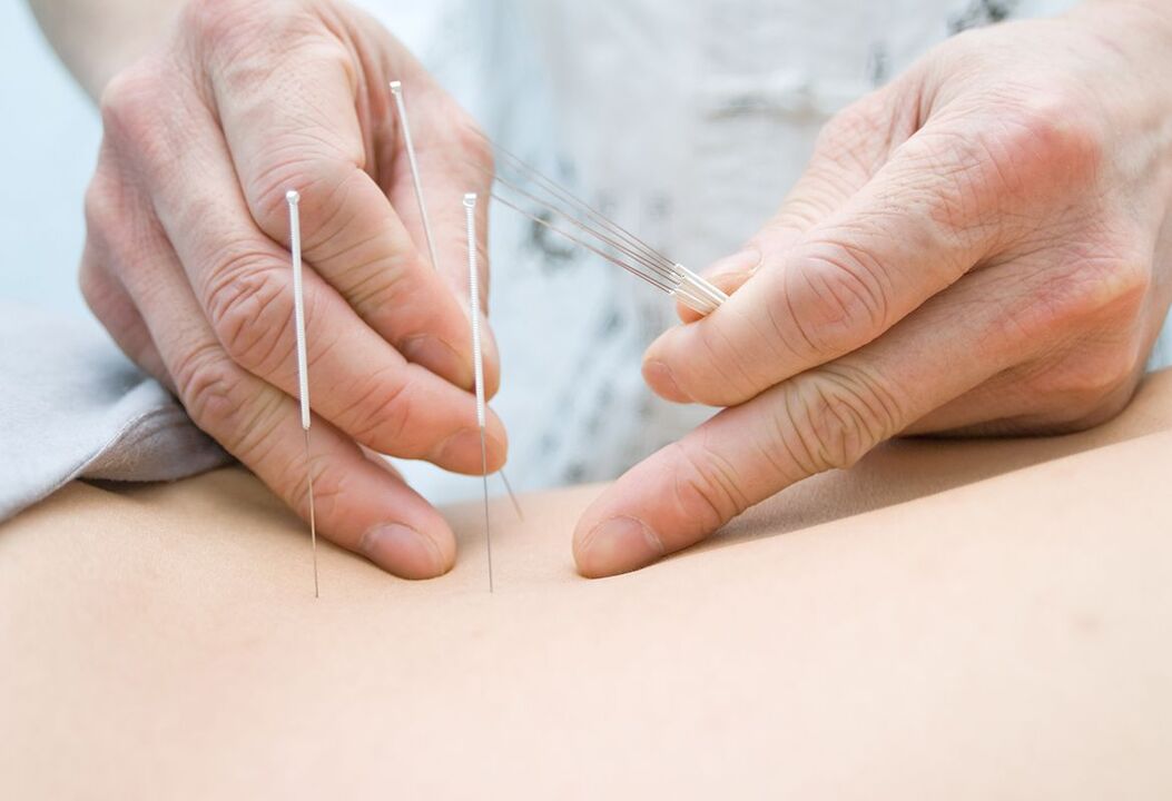 The doctor puts the needles